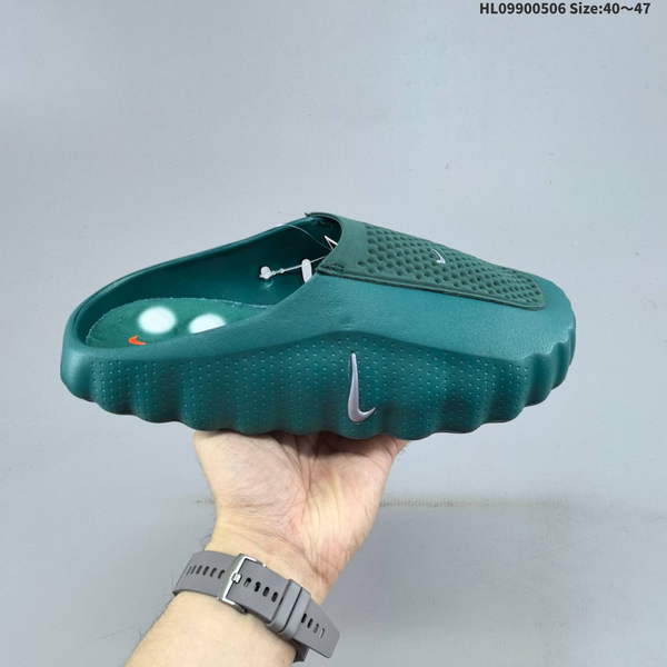 NIKE MIND 001 GREEN MEN'S AND WOMEN'S FOOT MASSAGE SLIPPERS ARE DESIGNED FOR COMPREHENSIVE INDOOR AND OUTDOOR TRAINING. FEATURING A PREDOMINANTLY BEIGE COLOR WITH PERFORATED DETAILS, THEY OFFER OPTIMAL FOOT MASSAGE COMFORT.
