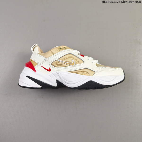 NIKE M2K RETRO-STYLE DAD SHOE IS CRAFTED FROM PREMIUM LEATHER, FEATURING AN EXAGGERATEDLY STREAMLINED DESIGN THAT EMBODIES CLASSIC "DAD" ELEMENTS WHILE MAINTAINING A CONTEMPORARY, FUTURISTIC AESTHETIC.