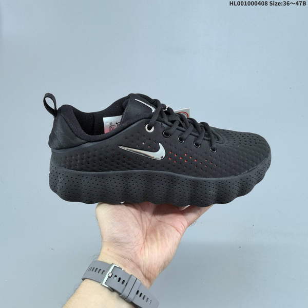 NIKE MIND 002 IS A LOW-TOP BLACK ATHLETIC SHOE WITH INSOLE MASSAGE TECHNOLOGY, SPECIFICALLY DESIGNED FOR COMPREHENSIVE INDOOR AND OUTDOOR TRAINING. ITS OVERALL COLOR SCHEME IS PREDOMINANTLY BLACK, FEATURING PERFORATIONS.
