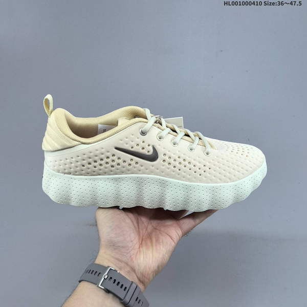 NIKE MIND 002 IN BEIGE ORANGE – A UNISEX SOLE MASSAGE SHOE DESIGNED FOR COMPREHENSIVE INDOOR AND OUTDOOR TRAINING, FEATURING A PREDOMINANTLY BEIGE COLOR SCHEME.