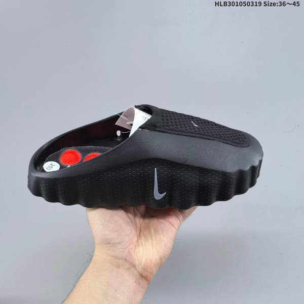 NIKE MIND 001 BLACK FOOT-MASSAGE TECHNOLOGY BAGGY SLIPPERS ARE SPECIFICALLY DESIGNED FOR COMPREHENSIVE INDOOR AND OUTDOOR TRAINING. FEATURING A PREDOMINANTLY RED COLOR SCHEME WITH PERFORATED DETAILS, THEY OFFER OPTIMAL COMFORT.