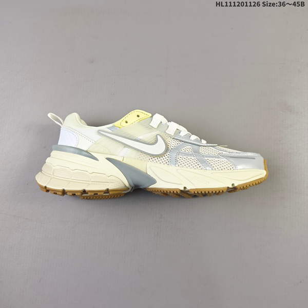NIKE V2K RUN IS A RETRO-INSPIRED ATHLETIC SHOE WITH A BREATHABLE MESH UPPER. ITS SLEEK GRAY-SILVER MATERIAL PROVIDES EXCELLENT FIT, WHILE SWOOSH LOGO ON SIDE AND TOE DESIGN ENHANCE ITS DISTINCTIVE STYLE.