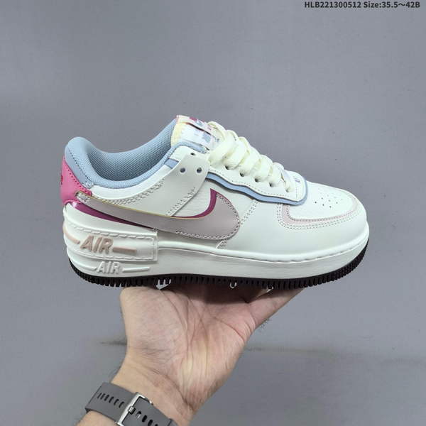 NIKE WMNS AIR FORCE 1 SHADOW IS A LIGHTWEIGHT, HIGH-TOP SNEAKER WITH A VERSATILE DESIGN FEATURING A MAROON COLOR SCHEME AND A COMPLETELY NEW, FEMININE DECONSTRUCTIVIST STYLE. IT FEATURES A DOUBLE-LAYERED, ULTRA-LIGHTWEIGHT CONSTRUCTION.