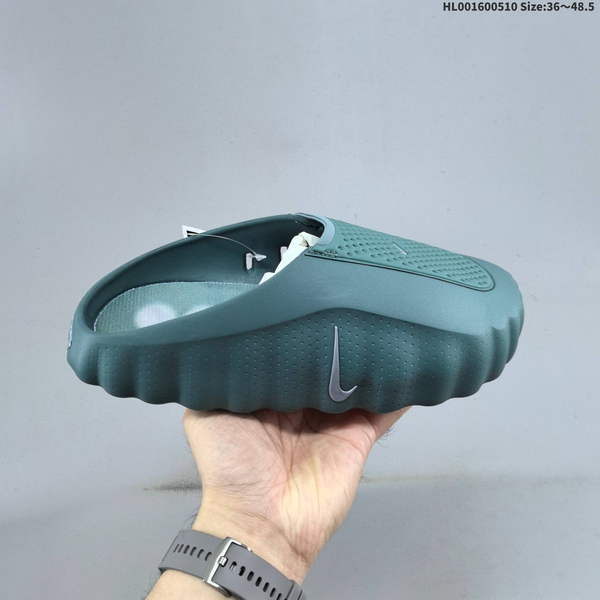 NIKE MIND 001 MINERAL SLATE COMBINATION BOTTOM – GREEN, UNISEX DESIGN WITH FOOT MASSAGE FEATURES AND SLIP-ON STYLE, SPECIFICALLY DESIGNED FOR COMPREHENSIVE INDOOR AND OUTDOOR TRAINING.