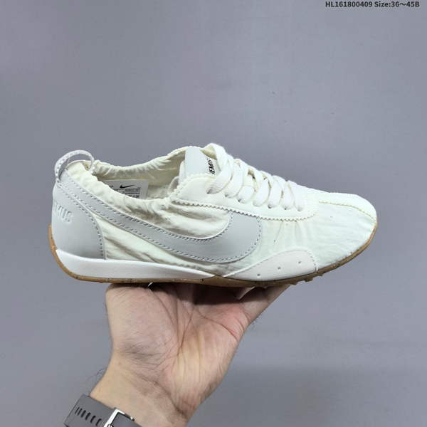 JACQUEMUS X NIKE JACUMOON: SOFT, COMFORTABLE, SLIP-RESISTANT, AND DURABLE LOW-TOP CASUAL SNEAKERS FEATURING A BRITISH RETRO DESIGN WITH A DISTINCTIVE CURVED TOE DETAIL, INSPIRED BY EUROPEAN AND AMERICAN FASHION SHOWS.