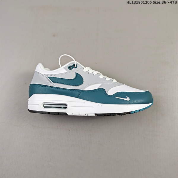 NIKE AIR MAX 1 – A CUSHIONED, SHOCK-ABSORBING, AND DURABLE SPORTS SHOE MADE FROM LEATHER, FABRIC, AND PATENT LEATHER FOR A PREMIUM FEEL ON FRONT.