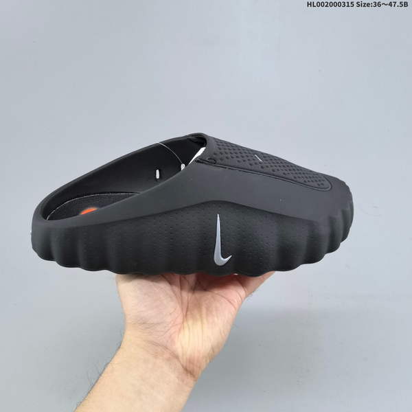 NIKE MIND 001 BLACK FOOT-MASSAGE TECHNOLOGY BAGGY SLIPPERS ARE SPECIFICALLY DESIGNED FOR COMPREHENSIVE INDOOR AND OUTDOOR TRAINING. FEATURING A PREDOMINANTLY RED COLOR SCHEME WITH PERFORATED DETAILS, THEY OFFER OPTIMAL COMFORT.