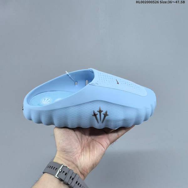 NOCTA X NIKE MIND 001 COLLABORATION EDITION IN LIGHT BLUE IS A UNISEX FOOT MASSAGE SLIPPERS WITH BUILT-IN INSOLE, SPECIFICALLY DESIGNED FOR COMPREHENSIVE INDOOR AND OUTDOOR TRAINING NEEDS.