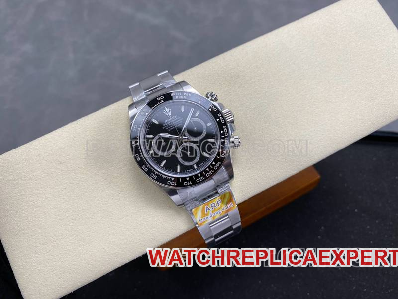 Real-life photos of the front of the ARF Factory Rolex Daytona with a black dial, spade-shaped hands, model 4131, and steel bracelet