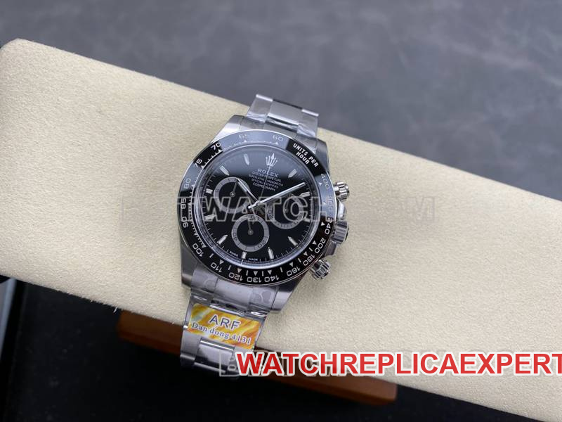 Real-life photos of the front of the ARF Factory Rolex Daytona with a black dial, spade-shaped hands, model 4131, and steel bracelet
