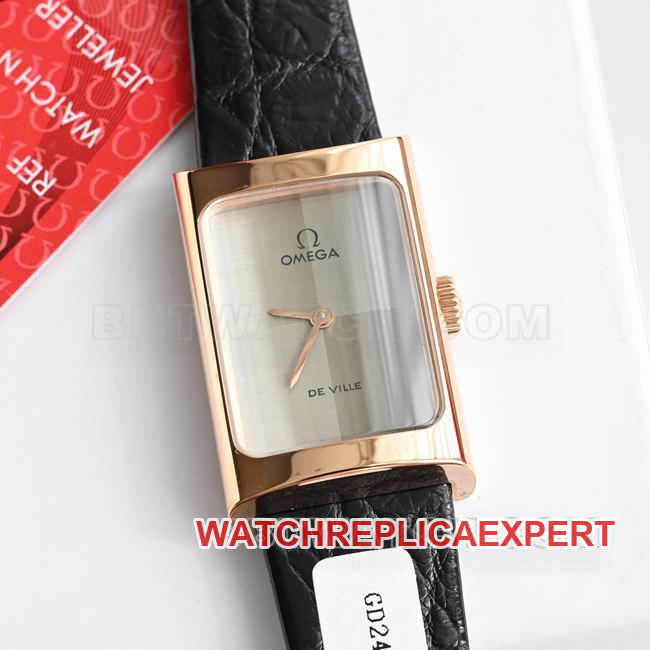 Real-life photo of the front of a top-tier Omega De Ville watch with a gray dial, quartz movement, and black leather strap