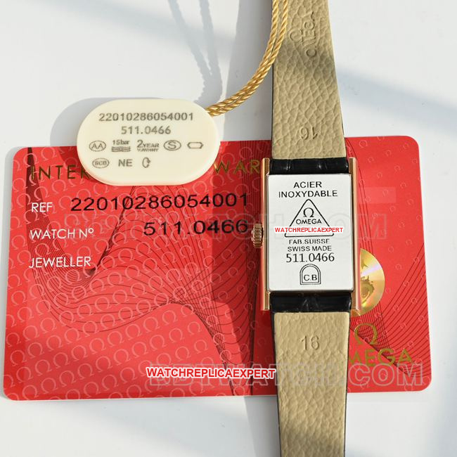 Actual photo of the back of a top-tier Omega De Ville watch with a gray dial, quartz movement, and black leather strap