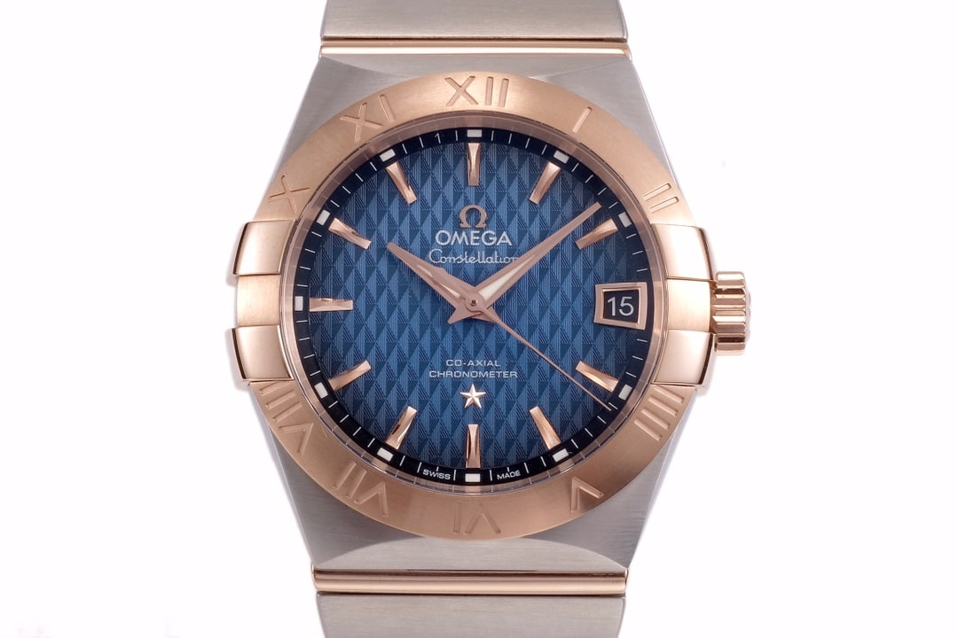 Omega1:1 vs constellation temperament blue dial8500 mechanical watch front view