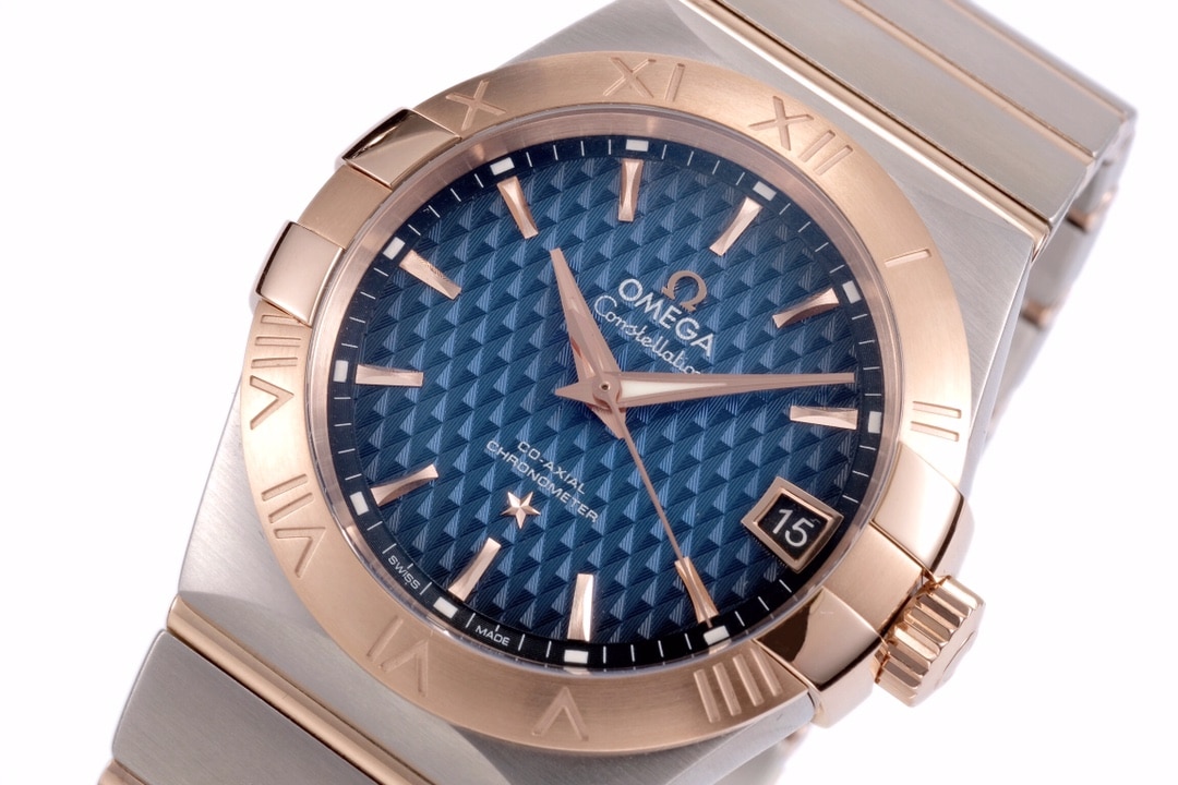 Omega1:1 vs constellation temperament blue dial8500 mechanical watch front view