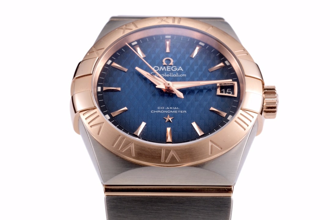Omega1:1 vs constellation temperament blue dial8500 mechanical watch front view