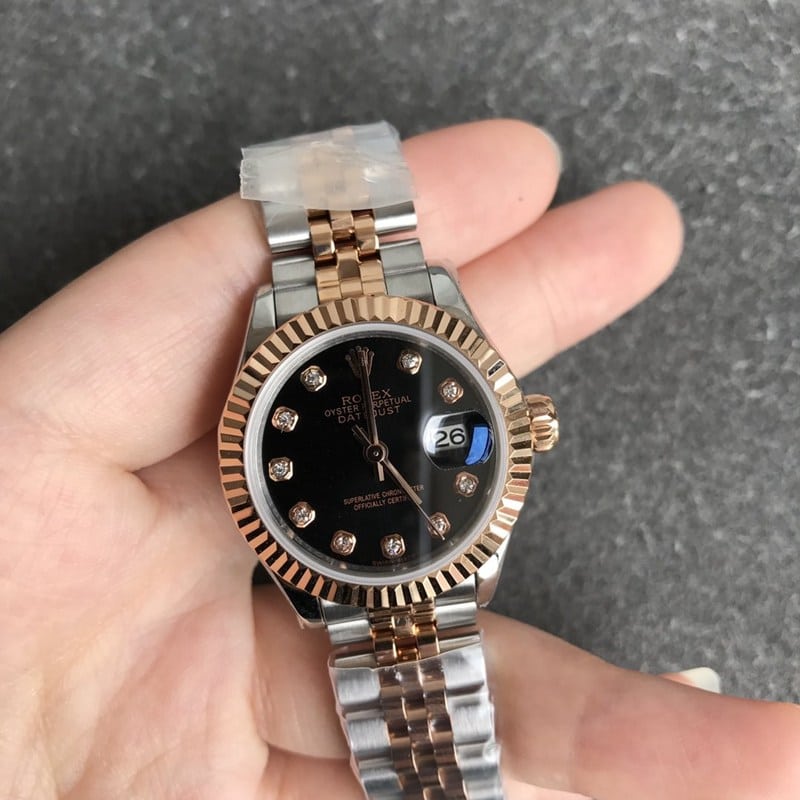 collectible Rolex Datejust watch for women, 28mm, mechanical, tiger tooth bezel, rose gold, black dial, front view