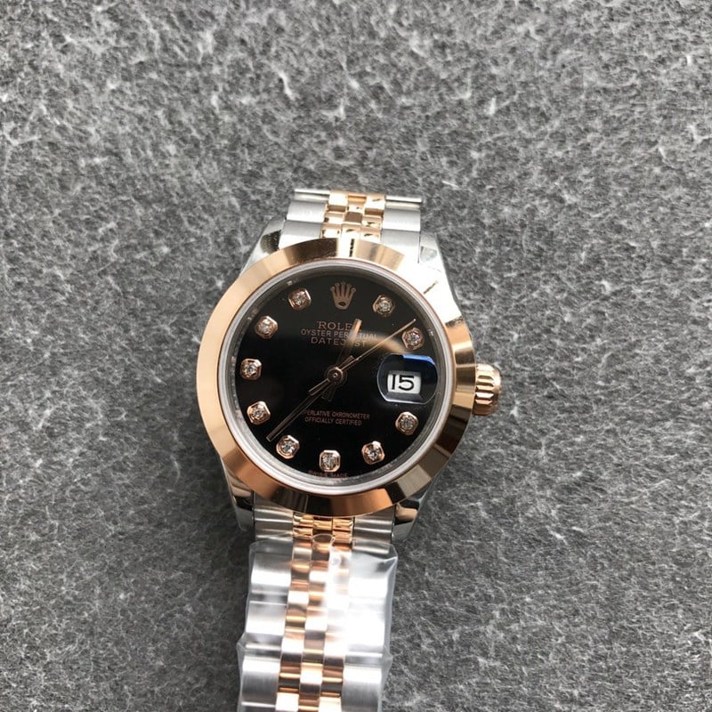 Rolex Datejust 28mm mechanical watch, fluted bezel, rose gold, black dial, diamond hour markers, front view