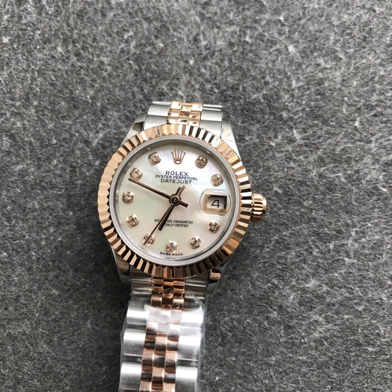 Rolex Datejust watch women's 28mm mechanical tiger tooth bezel rose gold mother-of-pearl dial diamond hour markers front view