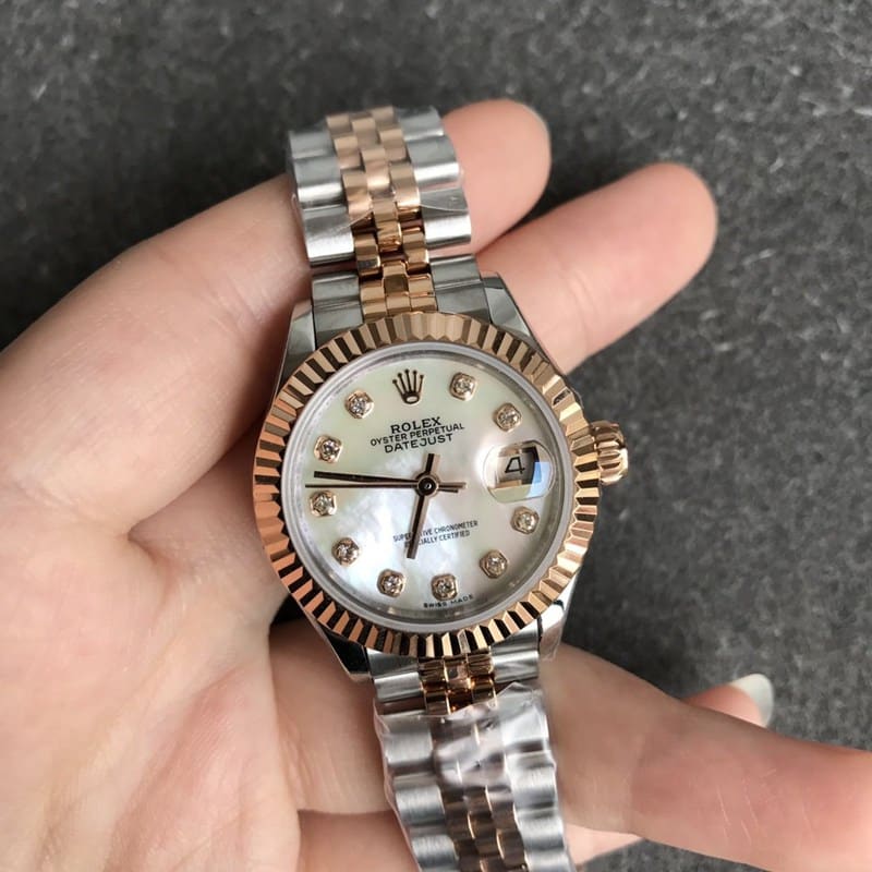 Rolex Datejust watch women's 28mm mechanical tiger tooth bezel rose gold mother-of-pearl dial diamond hour markers front view