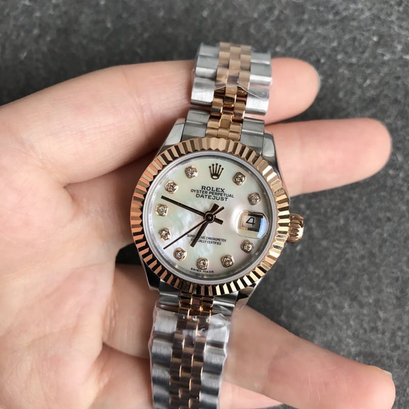 Rolex Datejust watch women's 28mm mechanical tiger tooth bezel rose gold mother-of-pearl dial diamond hour markers front view