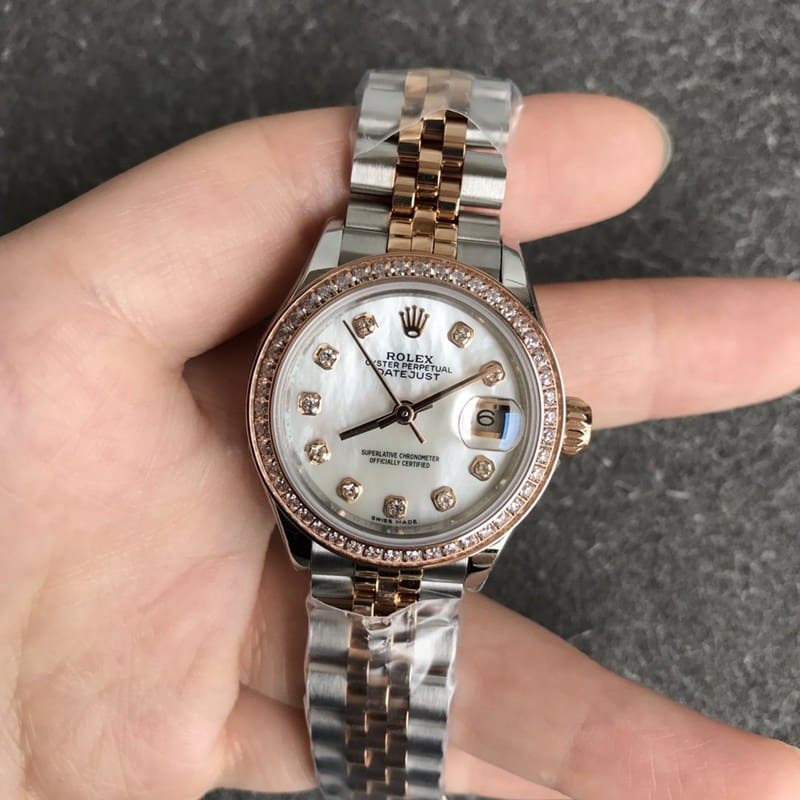 Rolex Datejust watch, women's 28mm, mechanical bezel, diamond, rose gold, mother-of-pearl dial, diamond hour markers, front view