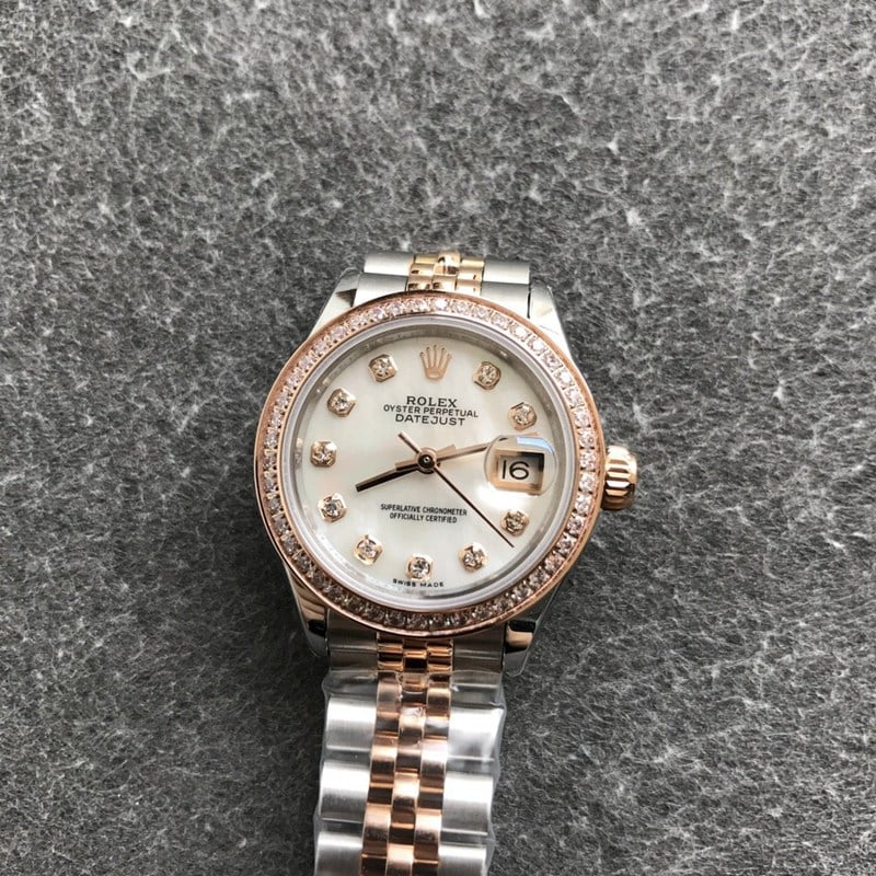 Rolex Datejust watch, women's 28mm, mechanical bezel, diamond, rose gold, mother-of-pearl dial, diamond hour markers, front view
