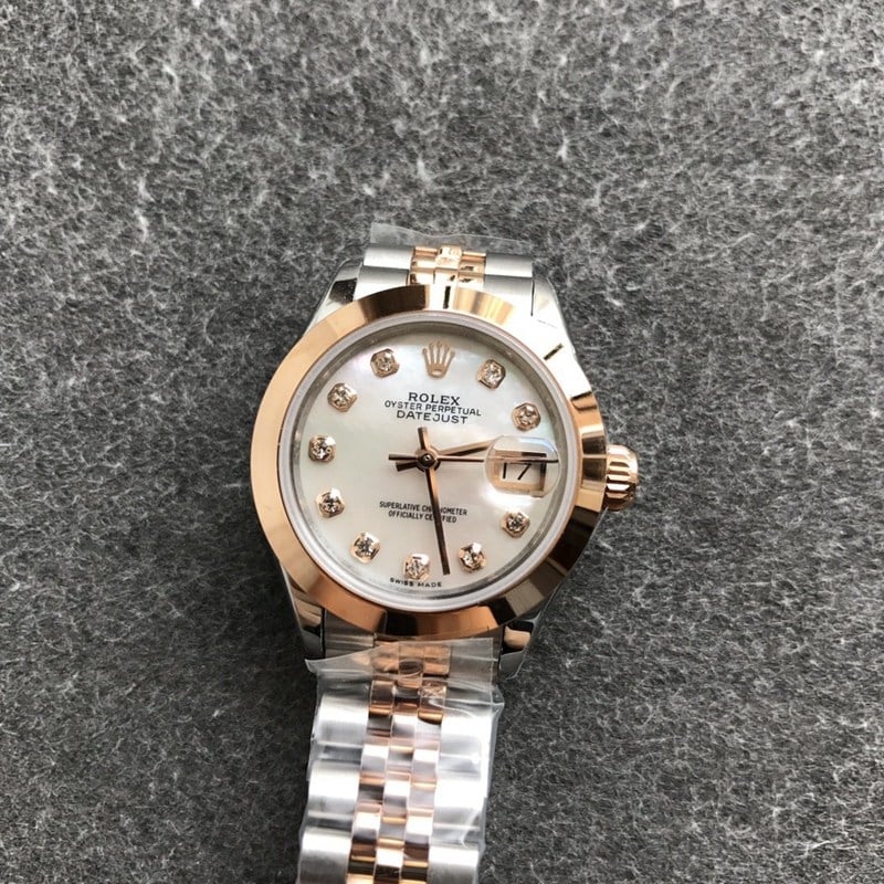 Rolex Datejust women's watch, 28mm, mechanical, fluted bezel, rose gold, mother-of-pearl dial, diamond hour markers, front view
