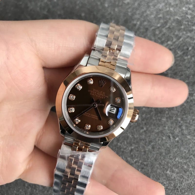 Rolex Datejust 28mm ladies' watch, mechanical, fluted bezel, rose gold, coffee dial, diamond markers, front view