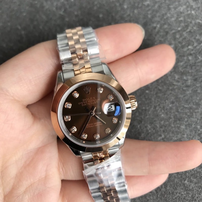 Rolex Datejust 28mm ladies' watch, mechanical, fluted bezel, rose gold, coffee dial, diamond markers, front view