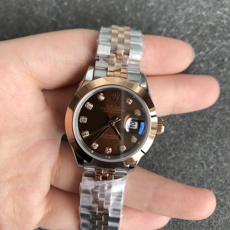 Rolex Datejust 28mm ladies' watch, mechanical, fluted bezel, rose gold, coffee dial, diamond markers, front view