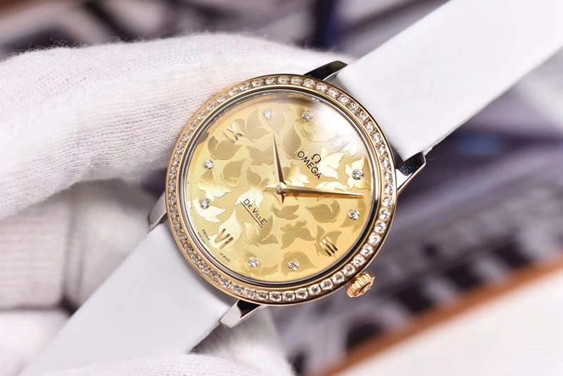 replicaOmega women's watch De Ville series rose gold butterfly dance 32.7mm front view