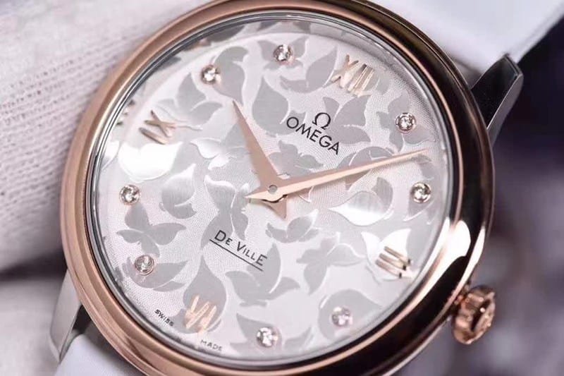 replicaOmega women's watch De Ville series yellow gold butterfly dance 32.7mm front view