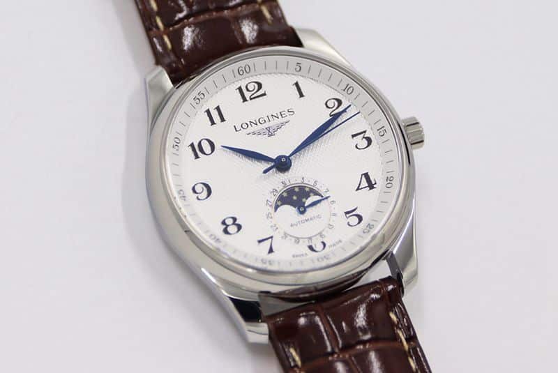 GS factory Longines famous series moon phase watch watch white dial brown bracelet front view