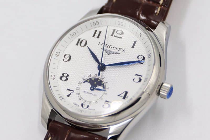 GS factory Longines famous series moon phase watch watch white dial brown bracelet front view