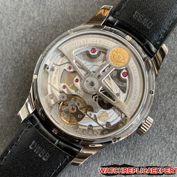ZF FactoryIWCreplica watch Portuguese series perpetual calendar date day display month green dial moving gold needle movement picture
