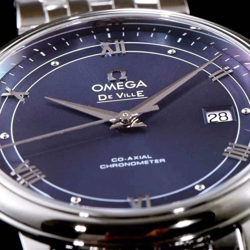 Omegareplica watch De Ville series men's mechanical ultra-thin watch track blue surface detail shots