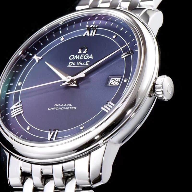 Omegareplica watch De Ville series men's mechanical ultra-thin watch track blue surface detail shots