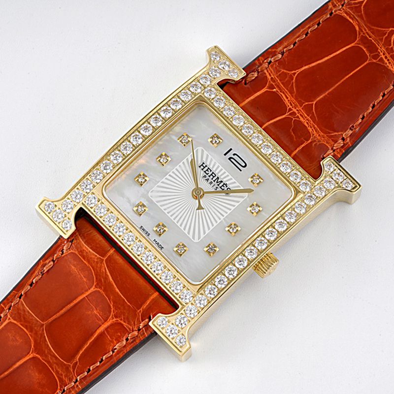 Hermès top-tier watch HeureH three-hand series ladies quartz white dial watch front view