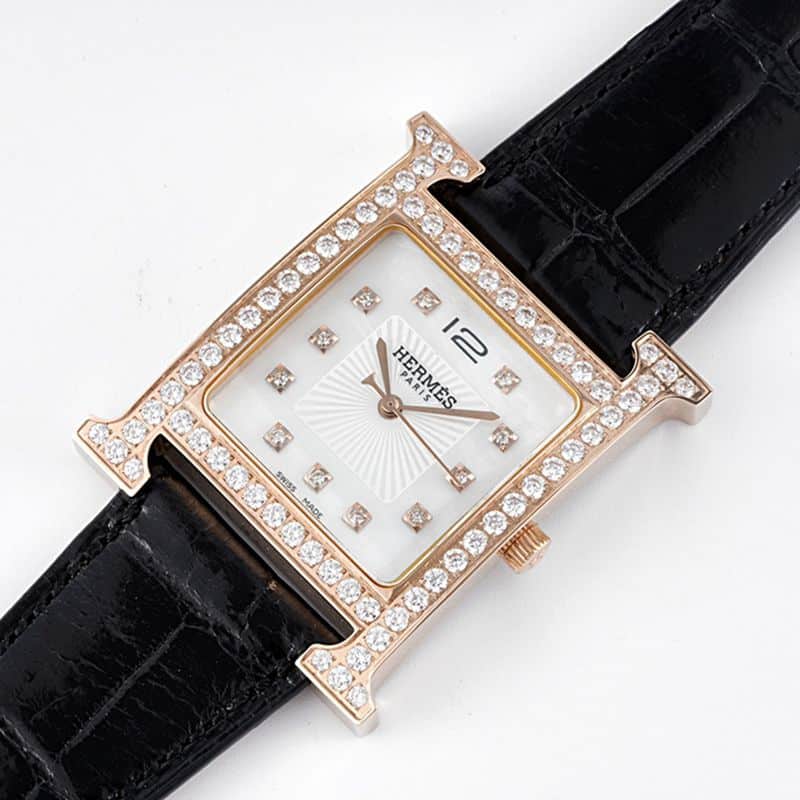 Hermès top-tier watch HeureH three-hand series ladies quartz diamondleather strap watch front view