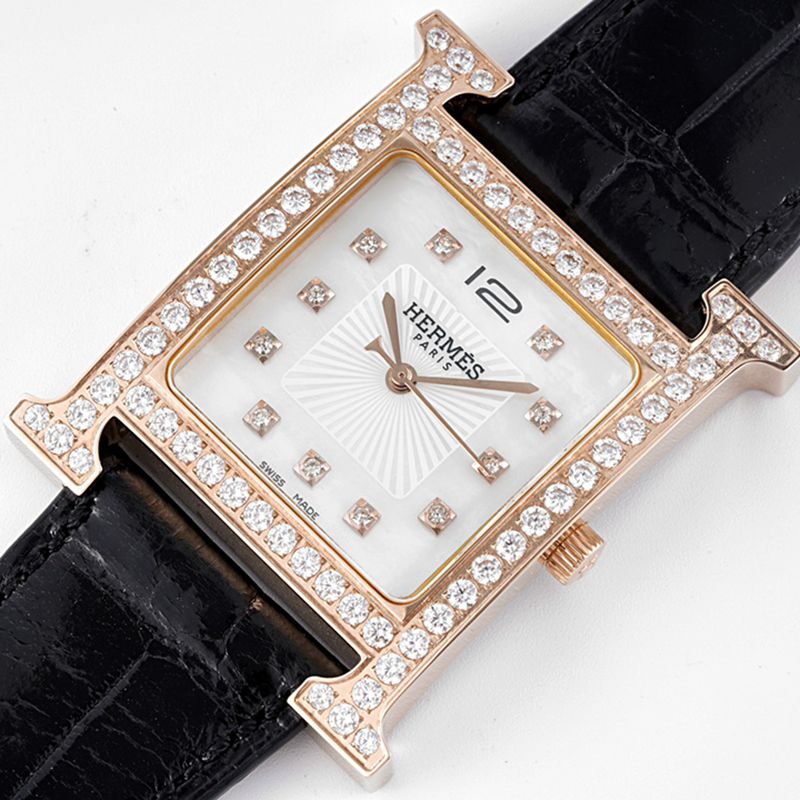 Hermès top-tier watch HeureH three-hand series ladies quartz diamondleather strap watch front view