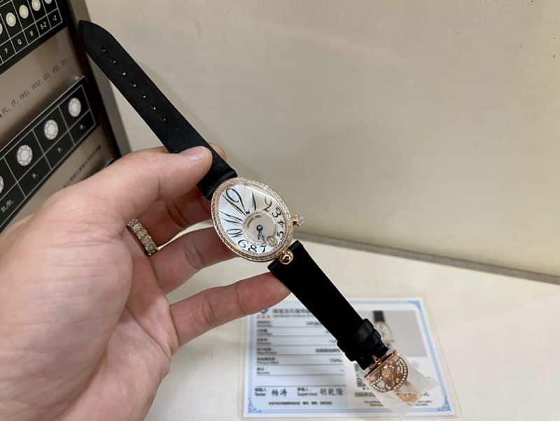 Real gold and real diamond Baoji top-tier watch queen series rose gold ladies diamondleather strap watch front view