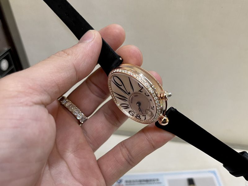 Real gold and real diamond Baoji top-tier watch queen series rose gold ladies diamondleather strap watch side view