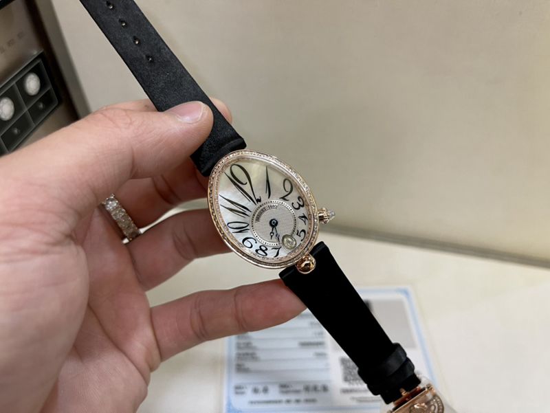Real gold and real diamond Baoji top-tier watch queen series rose gold ladies diamondleather strap watch front view