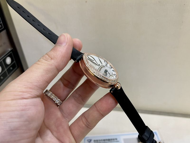 Real gold and real diamond Baoji top-tier watch queen series rose gold ladies diamondleather strap watch side view