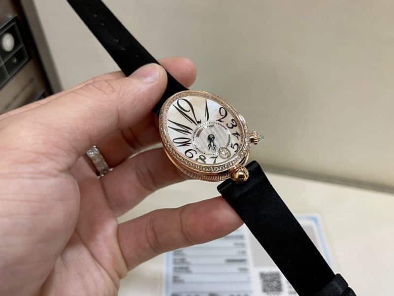 Real gold and real diamond Baoji top-tier watch queen series rose gold ladies diamondleather strap watch front view