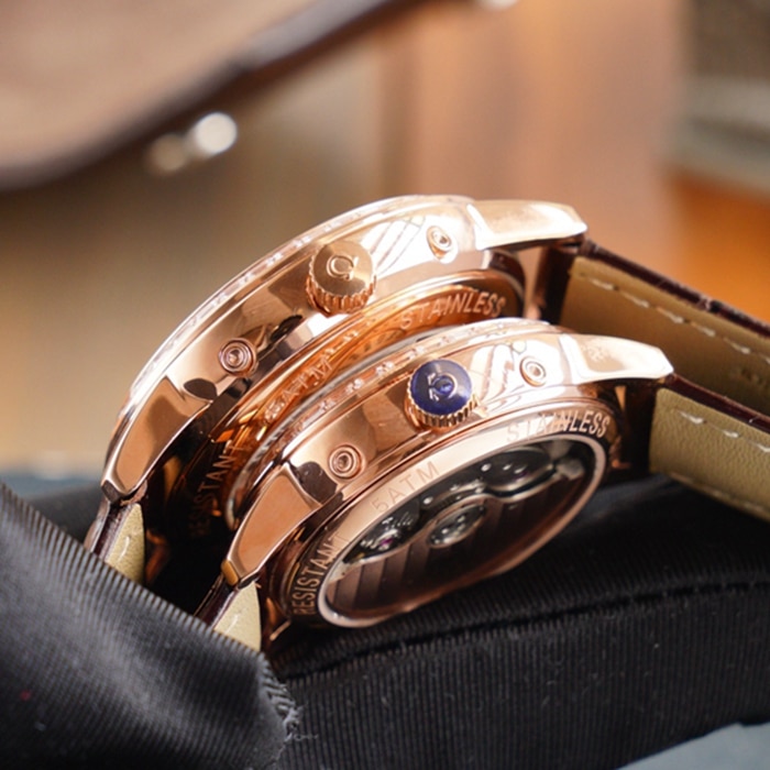 Side view of Omega complex function chronograph series perpetual calendar couple's watch