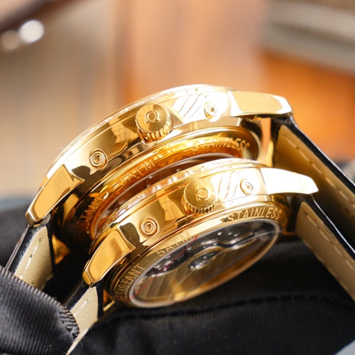 Side view of Omega complex function chronograph series perpetual calendar couple's watch