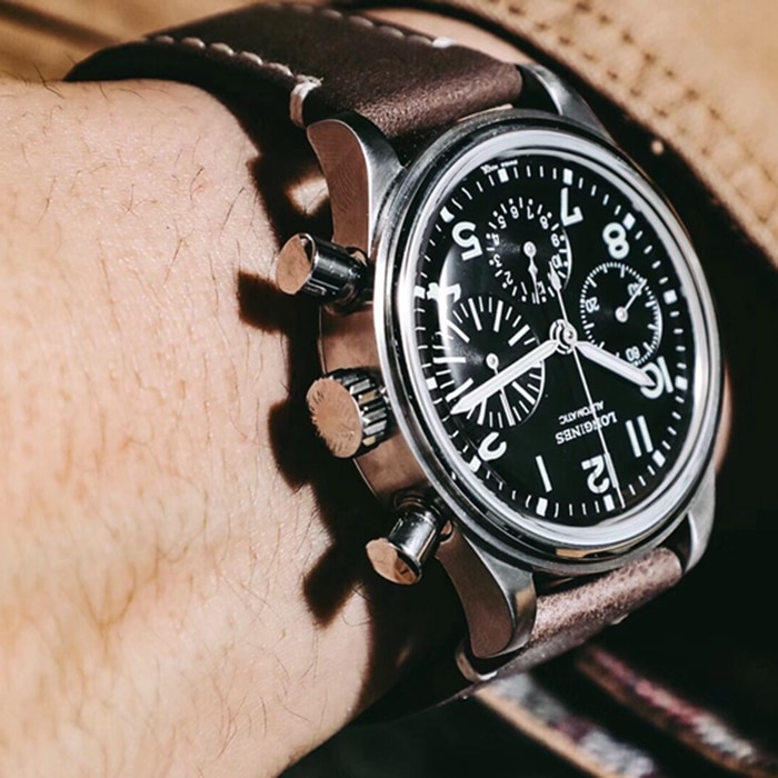 top-tier watch Longines men's black dialleather strap watch side view