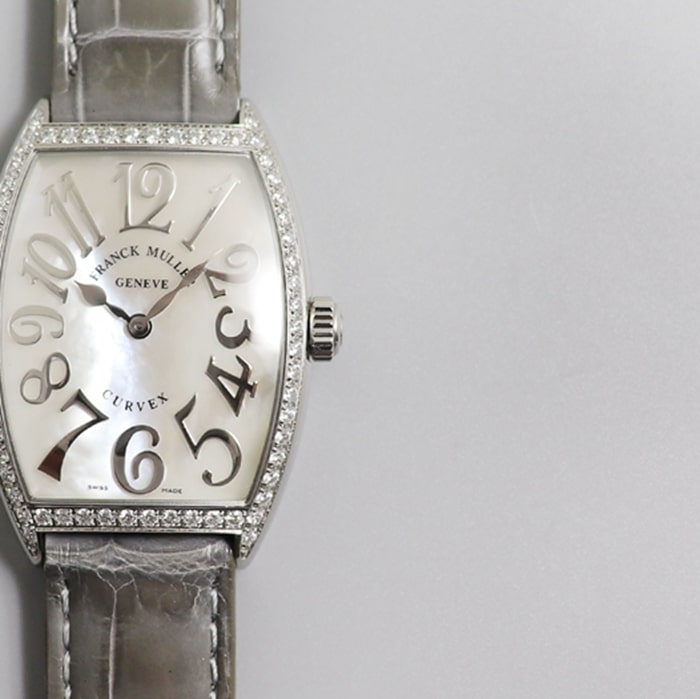Top-tier watch Frank Muller women's white dial barrel type quartzleather strap watch front view