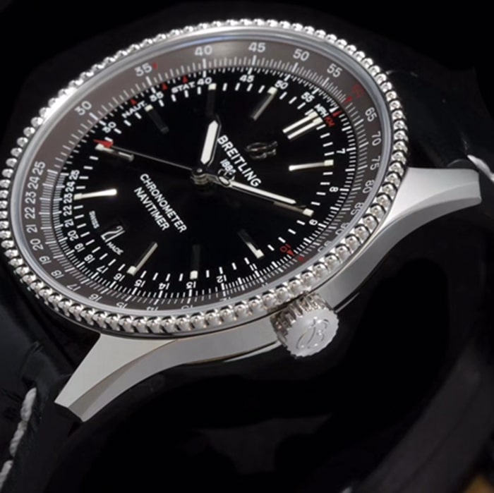 top-tier watch Breitling men's black dial aviation chronograph1 series leather strap watch side view